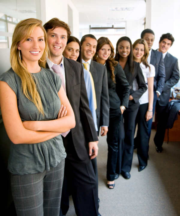 Group of diverse corporate office workers standing in diagonal row
